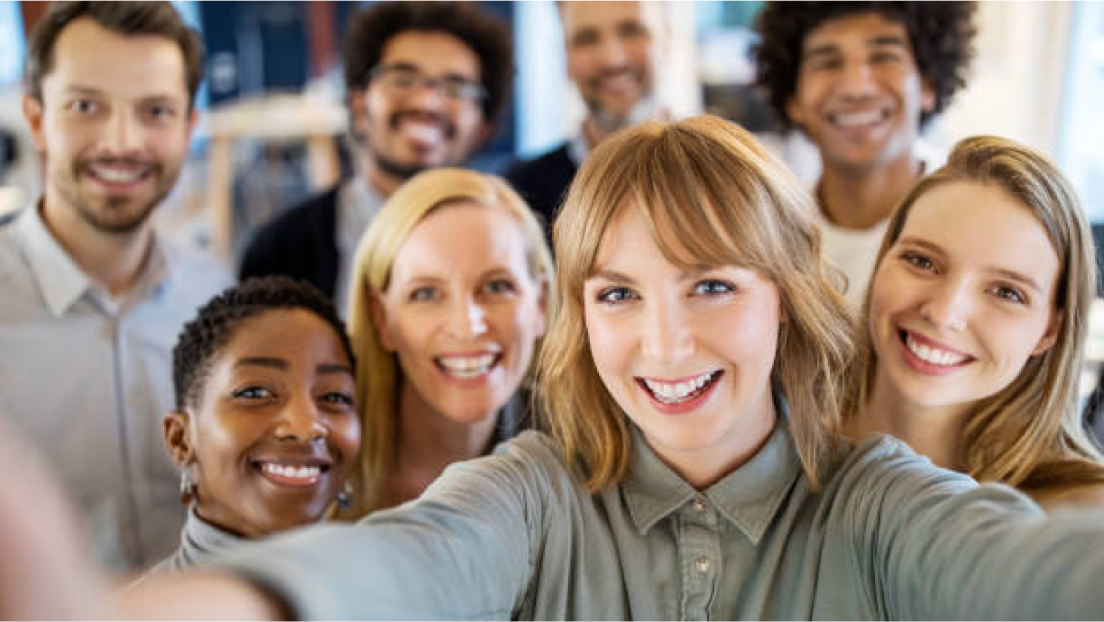 photograph of a group of young people taking a selfie