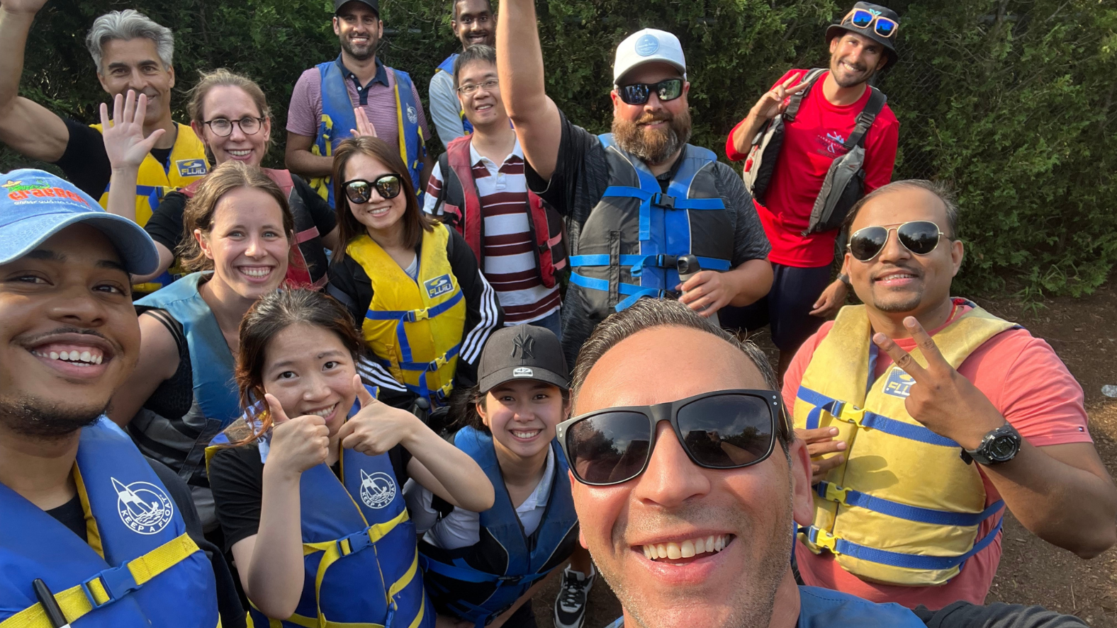 Stern Cohen team members on a day out on Toronto Island going voyageur canoeing.