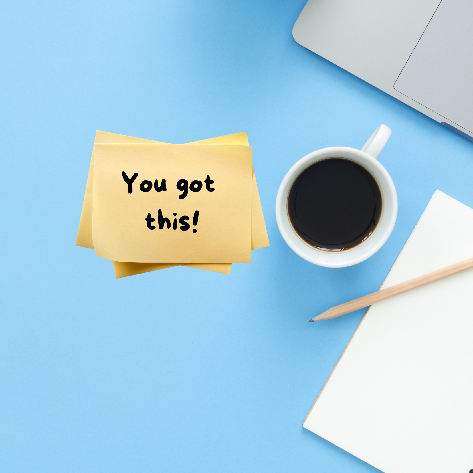 picture of a desk top with a motivational post it note on it saying You Got This!