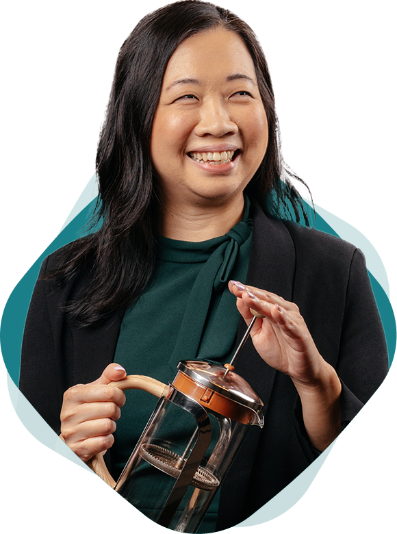 Photo of Evelyn Hui making coffee