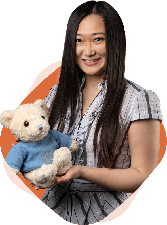 Photo of Fei Cao, MMPA, CPA, CMA holding a teddy bear