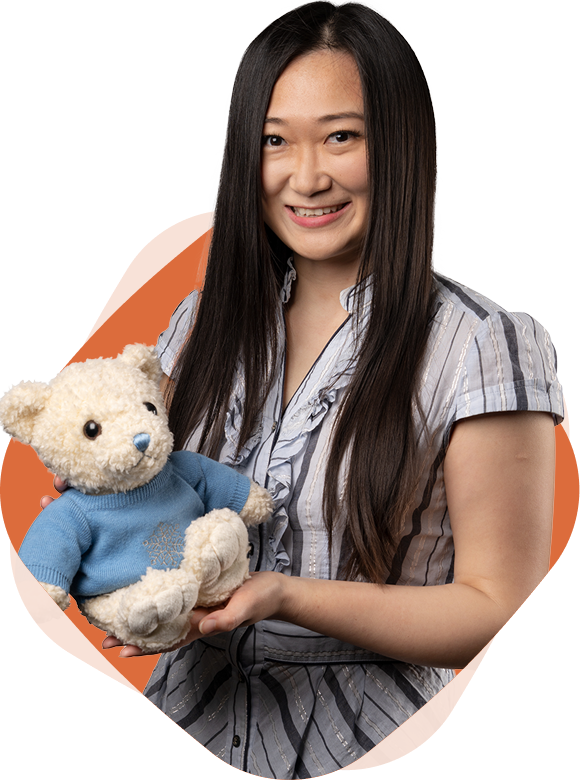 Photo of Fei Cao, MMPA, CPA, CMA holding a teddy bear