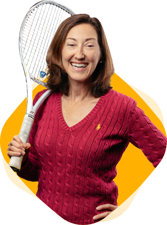 Photo of Julie James, Stern Cohen Marketing Director holding a tennis racquet