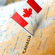 Picture of map of Canada and a Canadian flag.